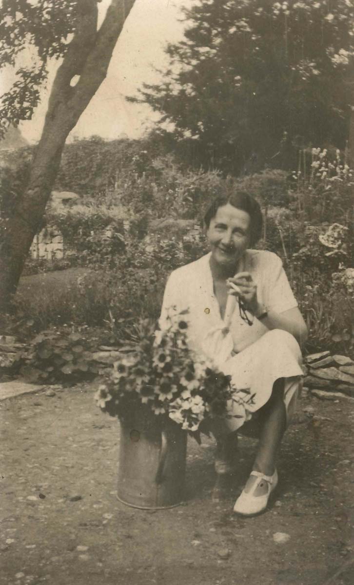 ‘My favorite bed-room picture of you is really an enlargement I had made of a snapshot I took at Campden: in the garden, kneeling (after breakfast) over a can of flowers you had been picking, and with an expression on your face that I like to see. Besides, it has the special interest for me that you were looking at the photographer, myself, at the moment.’ (5 October 1946); Emily Hale in the garden at Stamford House, Chipping Campden, 1935. ‘My favorite bed-room picture of you is really an enlargement I had made of a snapshot I took at Campden: in the garden, kneeling (after breakfast) over a can of flowers you had been picking, and with an expression on your face that I like to see. Besides, it has the special interest for me that you were looking at the photographer, myself, at the moment.’ (5 October 1946); Emily Hale in the garden at Stamford House, Chipping Campden, 1935.